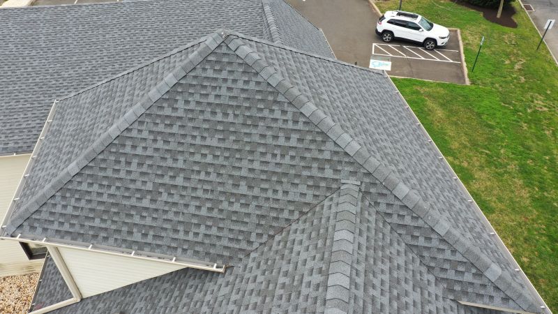 Signs Of Storm Damage On Asphalt Roofs