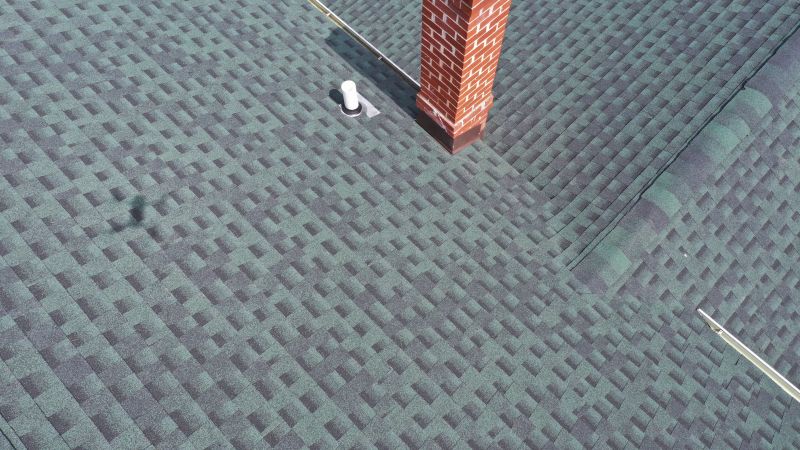 Signs Of Storm Damage On Asphalt Roofs
