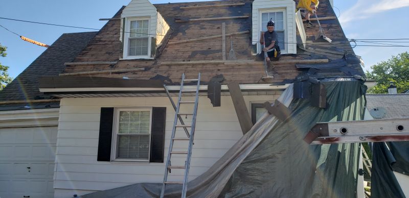 Signs Of Storm Damage On Asphalt Roofs